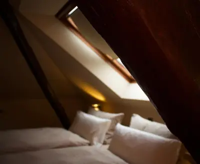 Ein Bett oder Betten in einem Zimmer der Unterkunft Hotel Landhaus Steinhoff