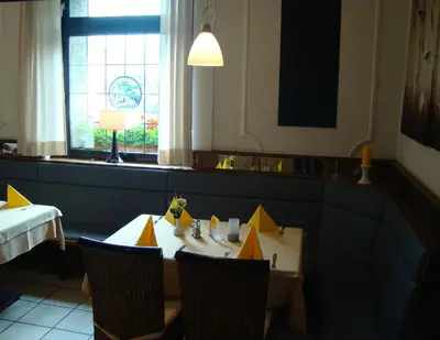 Ein Sitzbereich in der Unterkunft Hotel-Restaurant Handelshof