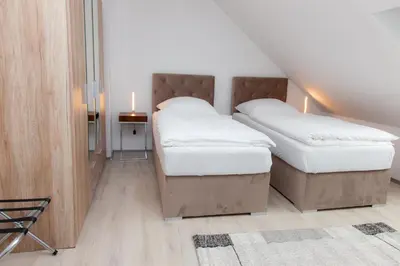 Ein Bett oder Betten in einem Zimmer der Unterkunft T&K Apartments near Messe Fair Trade Düsseldorf und Airport 3B
