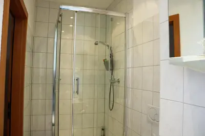 Ein Badezimmer in der Unterkunft Hotel Schmerkötter