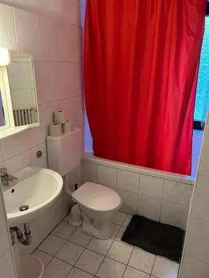 Ein Badezimmer in der Unterkunft Monteurwohnung Hagen Haus 1