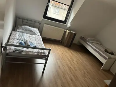 Ein Bett oder Betten in einem Zimmer der Unterkunft Monteurwohnung Hagen Haus 1