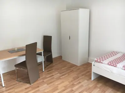 Ein Bett oder Betten in einem Zimmer der Unterkunft Monteurwohnung Hagen Haus 1