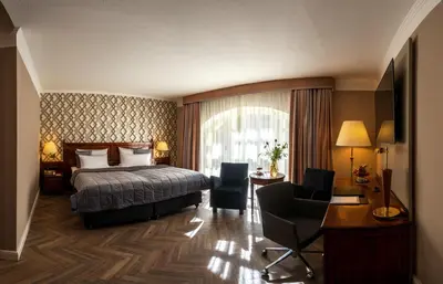 Ein Bett oder Betten in einem Zimmer der Unterkunft Parkhotel Engelsburg - 4 Sterne Superior