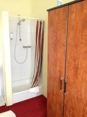 Ein Badezimmer in der Unterkunft Domo Hotel Mondial