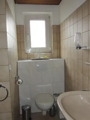 Ein Badezimmer in der Unterkunft Gästehaus Holiday
