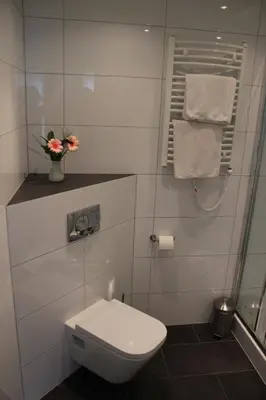 Ein Badezimmer in der Unterkunft Hotel Restaurant Kromberg