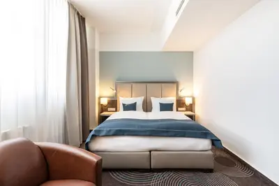 Ein Bett oder Betten in einem Zimmer der Unterkunft Garner Hotel Essen - Handelshof by IHG