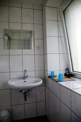 Ein Badezimmer in der Unterkunft Hotel Hoffmann