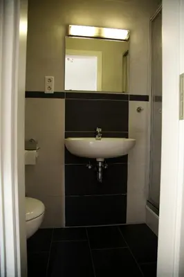 Ein Badezimmer in der Unterkunft Hotel Hoffmann