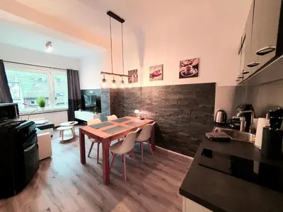 Küche/Küchenzeile in der Unterkunft Moderne Wohlfühloase zentral in Seenähe - Pillow menu, 2 Stk 55