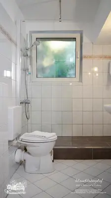 Ein Badezimmer in der Unterkunft Hotel-Restaurant Schmachtenbergshof