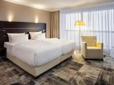 Ein Bett oder Betten in einem Zimmer der Unterkunft Mercure Hotel Lüdenscheid