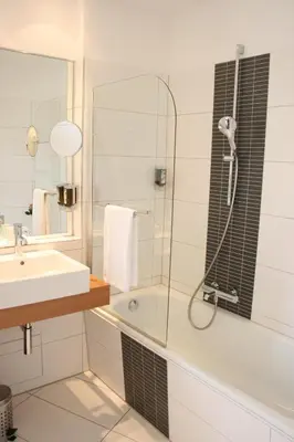 Ein Badezimmer in der Unterkunft Hotel Gräfrather Hof