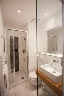 Ein Badezimmer in der Unterkunft Hotel Gräfrather Hof