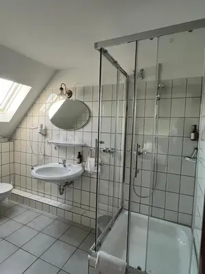Ein Badezimmer in der Unterkunft Hotel Fabritz