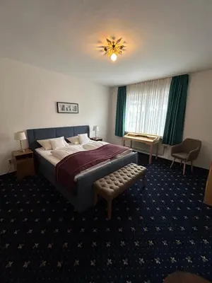 Ein Bett oder Betten in einem Zimmer der Unterkunft Hotel Fabritz