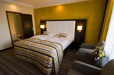 Ein Bett oder Betten in einem Zimmer der Unterkunft Hotel Moers van der Valk