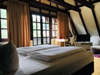 Ein Bett oder Betten in einem Zimmer der Unterkunft Dieckmann's Hotel
