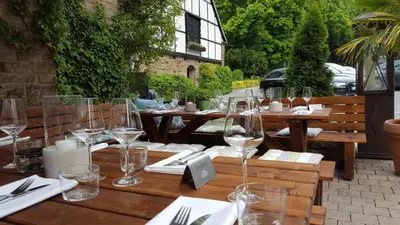 Ein Restaurant oder anderes Speiselokal in der Unterkunft Dieckmann's Hotel