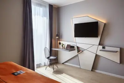 TV/Unterhaltungsangebot in der Unterkunft Holiday Inn - the niu, Hub Dusseldorf Messe by IHG