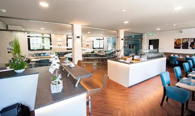 Ein Sitzbereich in der Unterkunft New Work Hotel Essen