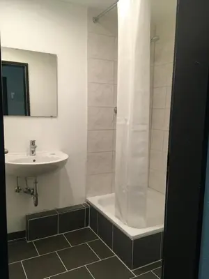 Ein Badezimmer in der Unterkunft Hostel Hamm by Geronimo