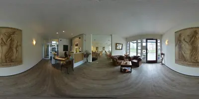 Ein Sitzbereich in der Unterkunft Hotel am Schloss Broich