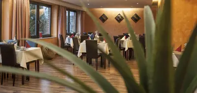 Ein Restaurant oder anderes Speiselokal in der Unterkunft Stargaze Home Hotel