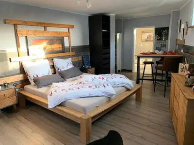 Ein Bett oder Betten in einem Zimmer der Unterkunft Stadtvilla Intzeplatz - Apartment Rügen
