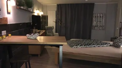 Ein Bett oder Betten in einem Zimmer der Unterkunft Stadtvilla Intzeplatz - Apartment Rügen