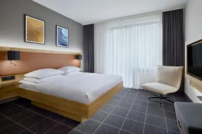 Ein Bett oder Betten in einem Zimmer der Unterkunft Four Points Flex by Sheraton Ratingen Düsseldorf Airport