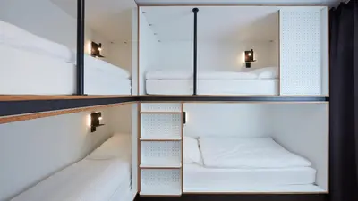 Ein Bett oder Betten in einem Zimmer der Unterkunft The Bunk Hostel
