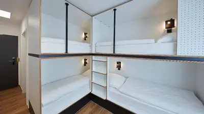 Ein Bett oder Betten in einem Zimmer der Unterkunft The Bunk Hostel