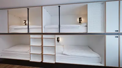 Ein Bett oder Betten in einem Zimmer der Unterkunft The Bunk Hostel