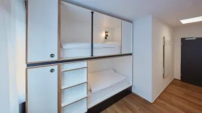 Ein Bett oder Betten in einem Zimmer der Unterkunft The Bunk Hostel