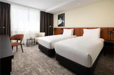 Ein Bett oder Betten in einem Zimmer der Unterkunft Hilton Düsseldorf