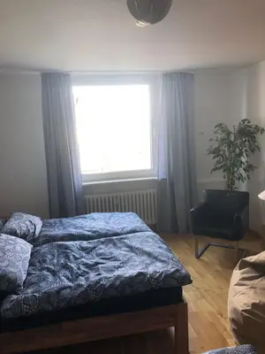 Ein Bett oder Betten in einem Zimmer der Unterkunft Micha's Ferienwohnung