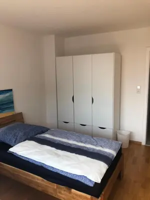Ein Bett oder Betten in einem Zimmer der Unterkunft Micha's Ferienwohnung