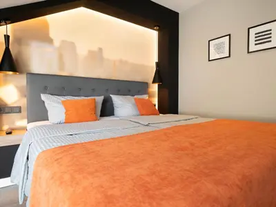 Ein Bett oder Betten in einem Zimmer der Unterkunft JustStay Ratingen Hotel & Apartments
