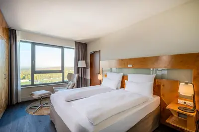 Ein Bett oder Betten in einem Zimmer der Unterkunft Welcome Hotel Gelsenkirchen
