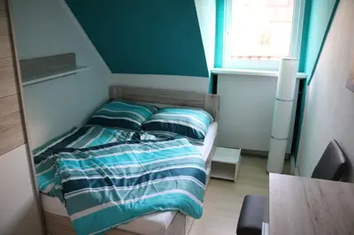 Ein Bett oder Betten in einem Zimmer der Unterkunft Modernes Ruhrgebietsdomizil