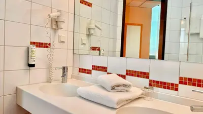 Ein Badezimmer in der Unterkunft Hotel Rhein-Ruhr Bottrop