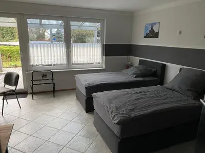 Ein Bett oder Betten in einem Zimmer der Unterkunft Adult only klimatisierte Ferienwohnung in Schwerte