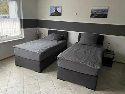Ein Bett oder Betten in einem Zimmer der Unterkunft Adult only klimatisierte Ferienwohnung in Schwerte