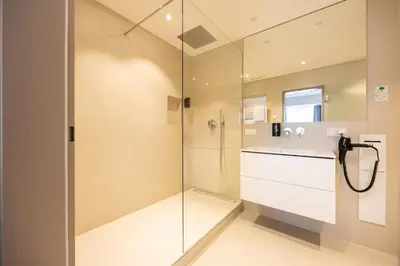 Ein Badezimmer in der Unterkunft Hotel Plaza