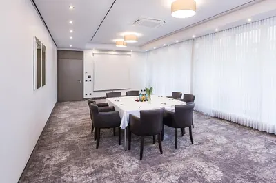 Ein Sitzbereich in der Unterkunft Hotel Plaza