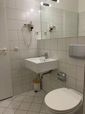 Ein Badezimmer in der Unterkunft Hotel Rüttenscheider Stern