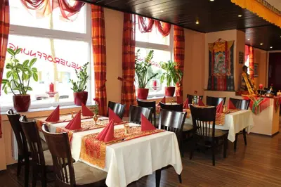 Ein Restaurant oder anderes Speiselokal in der Unterkunft Hotel Hubbert