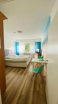 Ein Bett oder Betten in einem Zimmer der Unterkunft Ferienwohnung Koko